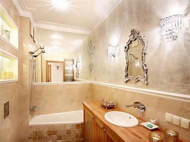 Ванна кімната для багатьох з нас асоціюється з кахельною плиткою або пофарбованими водостійкою фарбою стінами